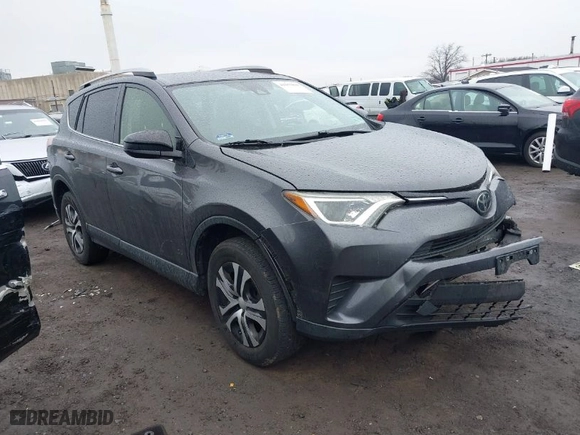 2018 Toyota RAV4 LE with VIN JTMBFREV0JJ223957, listed as a IAAI auction lot 41652810 with 144,629 mi miles. Bid and sale history available at carsss.com. Image 1.