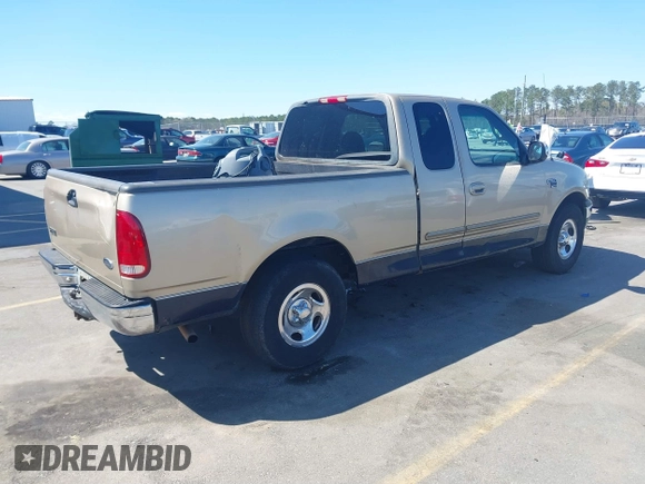 2000 Ford F-150 XL with VIN 1FTRX17L8YNB02069, listed as a IAAI auction lot 41813272 with 279,042 mi miles and . Bid and sale history available at DreamBid. Image 4.