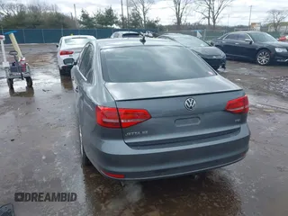 2015 Volkswagen Jetta Sedan 1.8T SE w/Connectivity with VIN 3VWD07AJ8FM260537, listed as a IAAI auction lot 41730338 with 155,724 mi miles. Bid and sale history available at carsss.com. Image 3.
