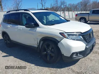 2019 Honda Passport Elite z VIN 5FNYF8H04KB005307, wystawiony jako IAAI lot #41828725 z przebiegiem 61 864 mil mil oraz . Historia ofert i sprzedaży dostępna na DreamBid. Obrazek 1.