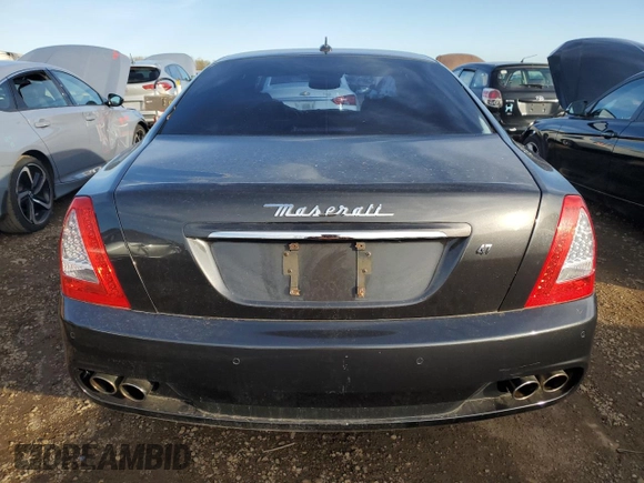 2009 Maserati Quattroporte z VIN ZAMJK39A290046644, wystawiony jako Copart lot #77969144 z przebiegiem 87 355 mil mil oraz Czysty tytuł • Clean title. Historia ofert i sprzedaży dostępna na DreamBid. Obrazek 6.