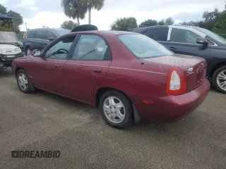 1999 Daewoo Nubira CDX z VIN KLAJB52Z5XK256700, wystawiony jako Copart lot #75085934 z przebiegiem Nie podano mil oraz Szkody całkowita. Historia ofert i sprzedaży dostępna na DreamBid. Obrazek 2.