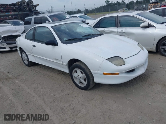 1999 Pontiac Sunfire SE z VIN 1G2JB1247X7582141, wystawiony jako IAAI lot #42198418 z przebiegiem Nie podano mil oraz . Historia ofert i sprzedaży dostępna na DreamBid. Obrazek 1.