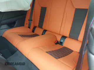 2024 BMW M4 Competition z VIN WBS33AZ05RCP68753, wystawiony jako IAAI lot #42143172 z przebiegiem 6736 mil mil oraz . Historia ofert i sprzedaży dostępna na DreamBid. Obrazek 8.