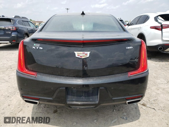 2019 Cadillac XTS Luxury с VIN 2G61M5S36K9154365, выставлен на аукционе Copart как лот 59473765 с пробегом 178 477 миль миль и Списание • Salvage title. История ставок и продаж доступна на DreamBid. Изображение 6.