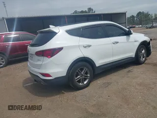 2017 Hyundai Santa Fe 2.4L z VIN 5NMZU3LB4HH026378, wystawiony jako IAAI lot #41906997 z przebiegiem 105 777 mil mil oraz . Historia ofert i sprzedaży dostępna na DreamBid. Obrazek 4.
