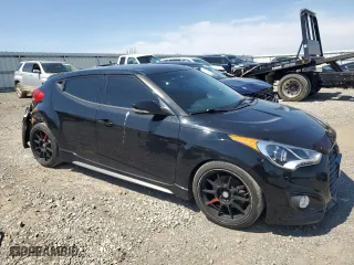 2014 Hyundai Veloster Turbo with VIN KMHTC6AE2EU207423, listed as a Copart auction lot 52151565 with 96,215 mi miles and Salvage Title. Bid and sale history available at carsss.com. Image 4.