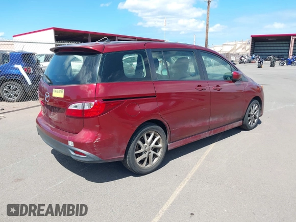 2012 Mazda 5 Touring with VIN JM1CW2CLXC0113181, listed as a IAAI auction lot 42653061 with 94,441 mi miles and . Bid and sale history available at DreamBid. Image 4.