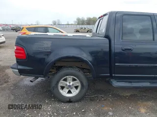 2002 Ford F-150 XLT with VIN 1FTRW08L32KD90202, listed as a IAAI auction lot 41850546 with 256,807 mi miles. Bid and sale history available at carsss.com. Image 20.