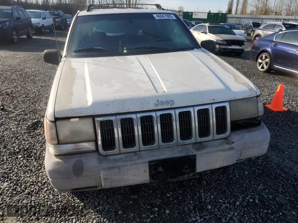 1996 Jeep Grand Cherokee Laredo with VIN 1J4EX58S3TC110154, listed as a Copart auction lot 46947805 with 268,507 mi miles and Salvage Title. Bid and sale history available at carsss.com. Image 5.