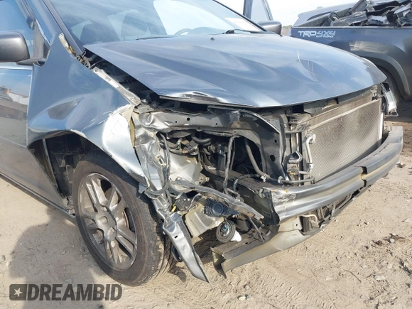 2010 Honda Odyssey EX-L with VIN 5FNRL3H7XAB099821, listed as a IAAI auction lot 41680729 with 217,458 mi miles and . Bid and sale history available at DreamBid. Image 6.