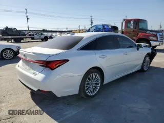 2020 Toyota Avalon Limited Hybrid z VIN 4T1D21FB9LU013719, wystawiony jako Copart lot #65184172 z przebiegiem 18 714 mil mil oraz . Historia ofert i sprzedaży dostępna na DreamBid. Obrazek 4.