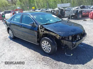 2014 Toyota Camry L with VIN 4T4BF1FK9ER408973, listed as a IAAI auction lot 42074491 with 183,934 mi miles and . Bid and sale history available at DreamBid. Image 1.