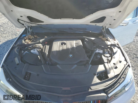 2017 BMW 7 Series 740i with VIN WBA7E2C32HG740649, listed as a Copart auction lot 45593145 with 122,793 mi miles and Salvage Title. Bid and sale history available at carsss.com. Image 11.