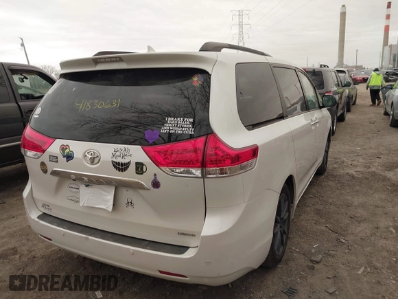 2011 Toyota Sienna XLE AAS with VIN 5TDYK3DC8BS003313, listed as a IAAI auction lot 41830631 with 214,514 mi miles and . Bid and sale history available at DreamBid. Image 4.