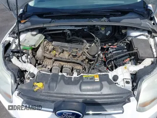 2012 Ford Focus SE with VIN 1FAHP3F24CL462319, listed as a IAAI auction lot 41981509 with 124,831 mi miles. Bid and sale history available at carsss.com. Image 10.