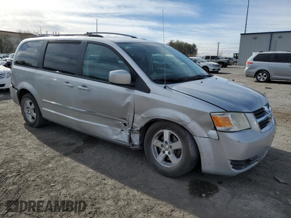 2009 Dodge Grand Caravan SXT z VIN 2D8HN54159R620187, wystawiony jako Copart lot #84703224 z przebiegiem 206 240 mil mil oraz Szkoda całkowita • Salvage title. Historia ofert i sprzedaży dostępna na DreamBid. Obrazek 4.