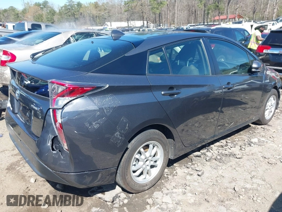 2017 Toyota Prius Two with VIN JTDKBRFU4H3036656, listed as a IAAI auction lot 41823354 with 59,233 mi miles and . Bid and sale history available at carsss.com. Image 4.