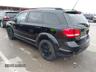 2013 Dodge Journey SXT with VIN 3C4PDDBG4DT660474, listed as a IAAI auction lot 41984607 with 124,926 mi miles and . Bid and sale history available at DreamBid. Image 3.