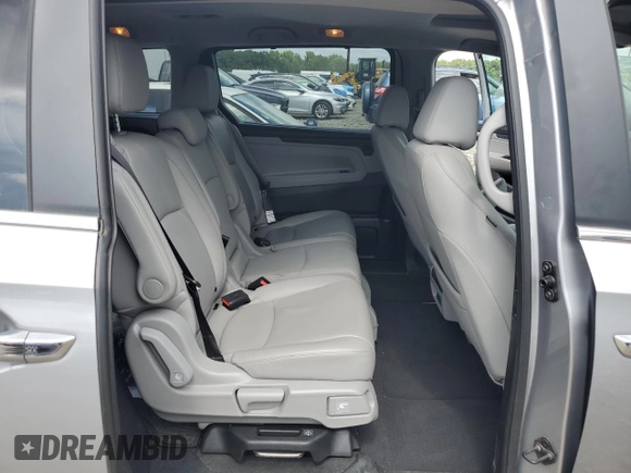 2021 Honda Odyssey EX-L with VIN 5FNRL6H79MB044718, listed as a Copart auction lot 65351134 with 28,888 mi miles and Salvage Title. Bid and sale history available at DreamBid. Image 11.