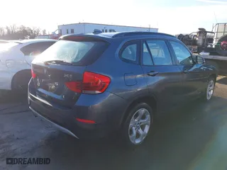 2014 BMW X1 sDrive28i with VIN WBAVM1C52EVW55890, listed as a IAAI auction lot 41512784 with 97,718 mi miles. Bid and sale history available at carsss.com. Image 4.