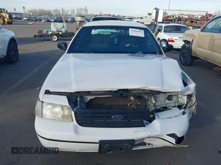 2000 Ford Crown Victoria Police Police Interceptor with VIN 2FAFP71W9YX149303, listed as a IAAI auction lot 41888402 with 148,081 mi miles. Bid and sale history available at carsss.com. Image 12.