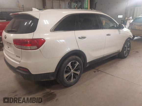 2016 Kia Sorento EX with VIN 5XYPHDA5XGG063815, listed as a IAAI auction lot 42366581 with 164,255 mi miles and . Bid and sale history available at DreamBid. Image 4.
