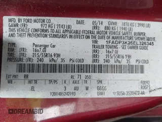2014 Ford Focus SE z VIN 1FADP3K26EL326345, wystawiony jako IAAI lot #42292956 z przebiegiem 121 369 mil mil oraz . Historia ofert i sprzedaży dostępna na DreamBid. Obrazek 9.