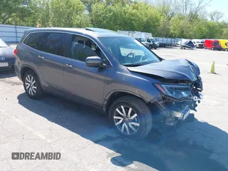 2020 Honda Pilot EX-L z VIN 5FNYF6H58LB049652, wystawiony jako IAAI lot #42213555 z przebiegiem 84 846 mil mil oraz . Historia ofert i sprzedaży dostępna na DreamBid. Obrazek 1.