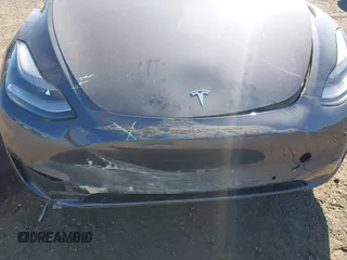 2022 Tesla Model Y Performance with VIN 7SAYGDEF9NF326944, listed as a IAAI auction lot 42111633 with Not Provided miles and . Bid and sale history available at DreamBid. Image 18.