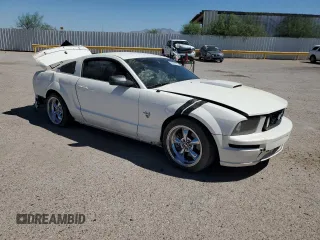 2009 Ford Mustang GT with VIN 1ZVHT82H995140721, listed as a Copart auction lot 60673295 with 96,595 mi miles and Salvage title. Bid and sale history available at DreamBid. Image 4.