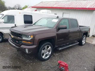 2016 Chevrolet Silverado 1500 LT with VIN 3GCUKREC1GG197043, listed as a IAAI auction lot 41953001 with 181,124 mi miles. Bid and sale history available at carsss.com. Image 2.