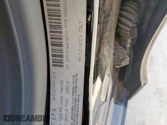 2014 Maserati Ghibli S Q4 with VIN ZAM57RTA8E1097777, listed as a Copart auction lot 59604665 with 86,135 mi miles and Salvage title. Bid and sale history available at DreamBid. Image 12.