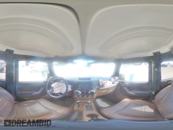 2012 Jeep Wrangler Unlimited Sahara with VIN 1C4HJWEG5CL205826, listed as a Copart auction lot 58222115 with 98,940 mi miles and Salvage title. Bid and sale history available at DreamBid. Image 15.