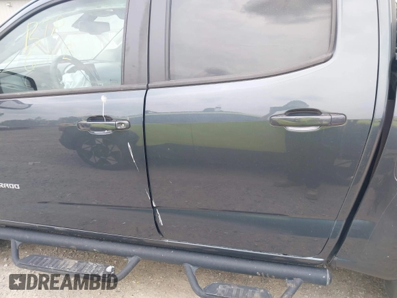 2019 Chevrolet Colorado 4WD Z71 with VIN 1GCGTDEN5K1328061, listed as a IAAI auction lot 42505934 with 76,520 mi miles and . Bid and sale history available at DreamBid. Image 14.