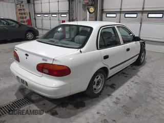 2000 Chevrolet Prizm LSi z VIN 1Y1SK528XYZ430060, wystawiony jako IAAI lot #41173059 z przebiegiem 96 086 mil mil oraz . Historia ofert i sprzedaży dostępna na DreamBid. Obrazek 4.