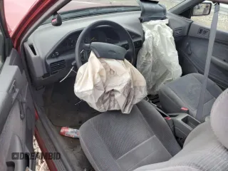 1996 Ford Escort z VIN 3FASP11J6TR151727, wystawiony jako Copart lot #55487725 z przebiegiem 118 276 mil mil oraz Nie do naprawy. Historia ofert i sprzedaży dostępna na DreamBid. Obrazek 8.