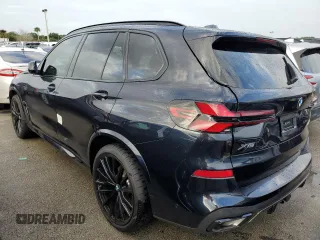 2025 BMW X5 sDrive40i with VIN 5UX13EU05S9W56291, listed as a Copart auction lot 73857164 with 0 mi miles and Salvage Title. Bid and sale history available at carsss.com. Image 2.