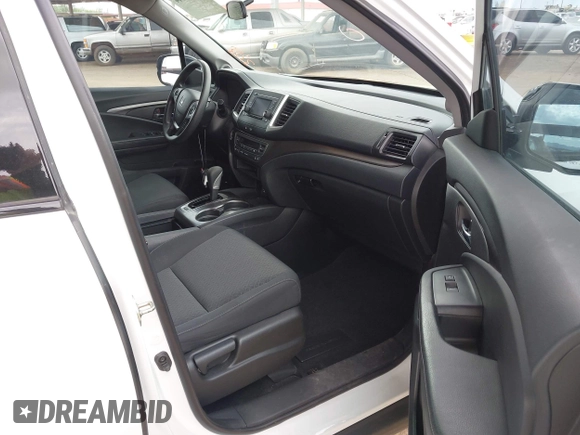2019 Honda Ridgeline Sport with VIN 5FPYK3F10KB044218, listed as a IAAI auction lot 41907044 with 151,887 mi miles and . Bid and sale history available at DreamBid. Image 5.