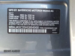 2017 BMW 5 Series 530i with VIN WBAJA5C35HG894968, listed as a IAAI auction lot 41060221 with 119,435 mi miles and . Bid and sale history available at DreamBid. Image 9.