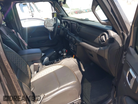 2021 Jeep Gladiator High Altitude z VIN 1C6HJTFG1ML597581, wystawiony jako IAAI lot #42191690 z przebiegiem 47 740 mil mil oraz . Historia ofert i sprzedaży dostępna na DreamBid. Obrazek 5.