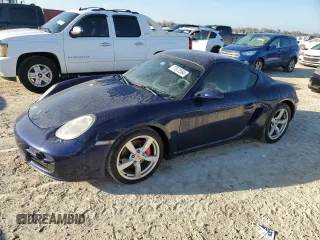 2006 Porsche Cayman S с VIN WP0AB298X6U784188, выставлен на аукционе Copart как лот 77872504 с пробегом Не указан миль и Списание • Salvage title. История ставок и продаж доступна на DreamBid. Изображение 1.