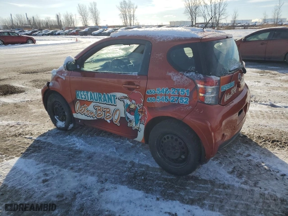 2012 Scion iQ with VIN JTNJJXB02CJ010868, listed as a Copart auction lot 81313514 with 216,297 mi miles and Salvage Title. Bid and sale history available at carsss.com. Image 2.