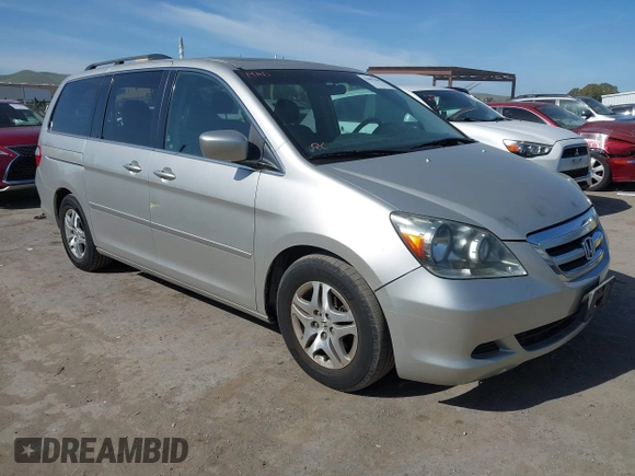 2005 Honda Odyssey EX-L with VIN 5FNRL38705B008884, listed as a IAAI auction lot 42081384 with 219,336 mi miles. Bid and sale history available at carsss.com. Image 1.