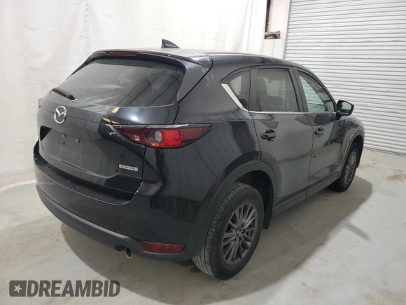 2021 Mazda CX-5 Touring with VIN JM3KFBCM5M0343577, listed as a Copart auction lot 52411005 with 70,372 mi miles and Clean Title. Bid and sale history available at carsss.com. Image 3.