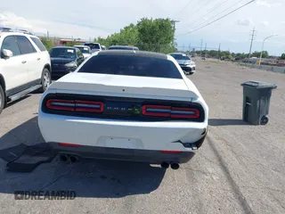 2015 Dodge Challenger SXT Plus with VIN 2C3CDZBG3FH913585, listed as a IAAI auction lot 42609599 with 85,524 mi miles and . Bid and sale history available at DreamBid. Image 16.