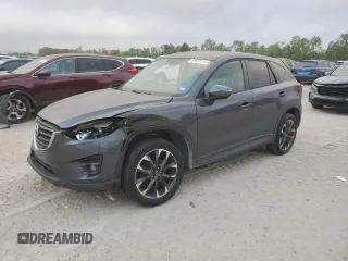 2016 Mazda CX-5 Grand Touring with VIN JM3KE4DY5G0865923, listed as a Copart auction lot 51637115 with 151,174 mi miles and Salvage Title. Bid and sale history available at carsss.com. Image 1.
