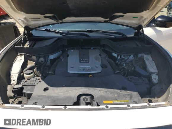 2015 Infiniti QX70 z VIN JN8CS1MW5FM481185, wystawiony jako Copart lot #52884555 z przebiegiem Nie podano mil oraz Szkoda całkowita • Salvage title. Historia ofert i sprzedaży dostępna na DreamBid. Obrazek 11.