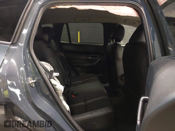 2024 Mazda CX-50 S Select with VIN 7MMVABAM9RN204554, listed as a IAAI auction lot 40833559 with 10,335 mi miles and . Bid and sale history available at DreamBid. Image 8.