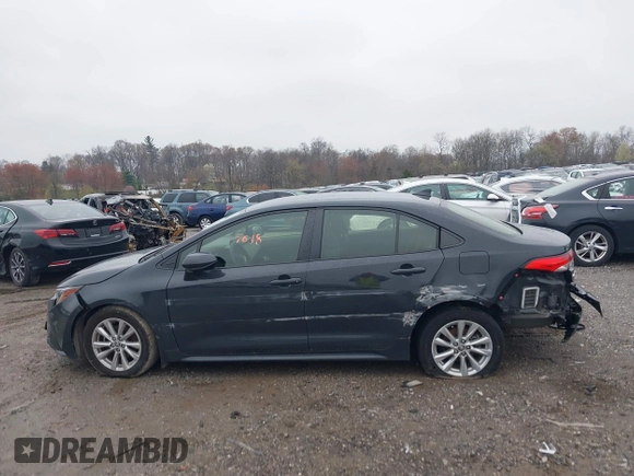 2023 Toyota Corolla LE with VIN JTDB4MEE8P3003083, listed as a IAAI auction lot 42007618 with 85,858 mi miles and . Bid and sale history available at DreamBid. Image 14.